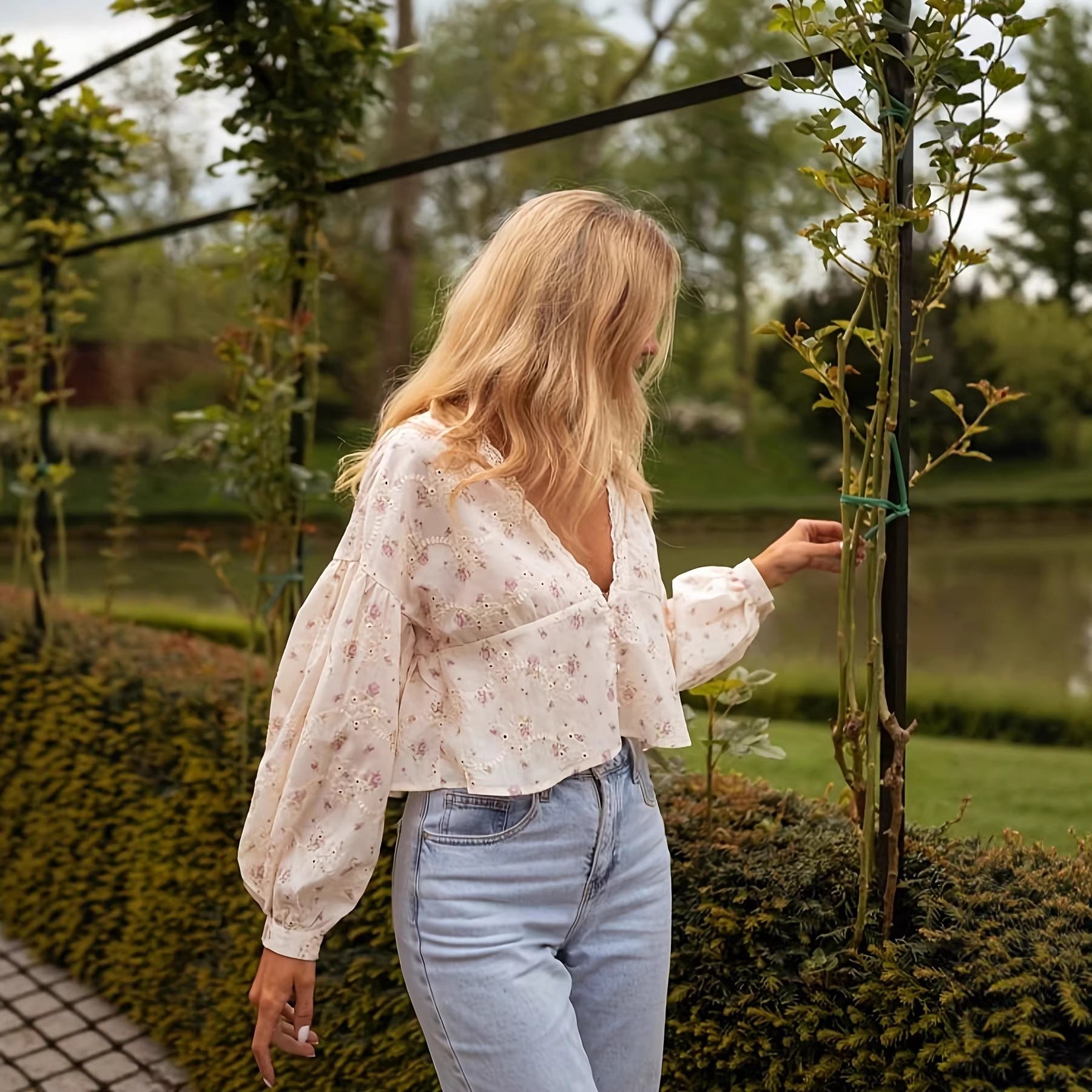 Embroidered Fabric Lantern Sleeves And A V-neck With Lace Detailinga Sophisticated Blouse